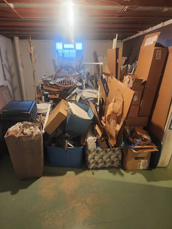 Roll-off dumpster container at job site for 2 Yard Dumpster Rental in Abington